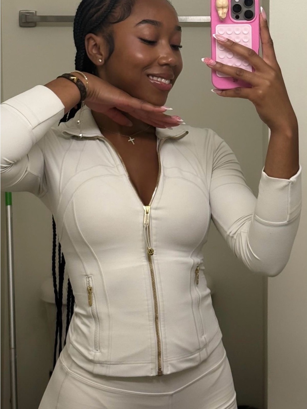 Fitted White Zip-Front Women's Top with Gold Hardware